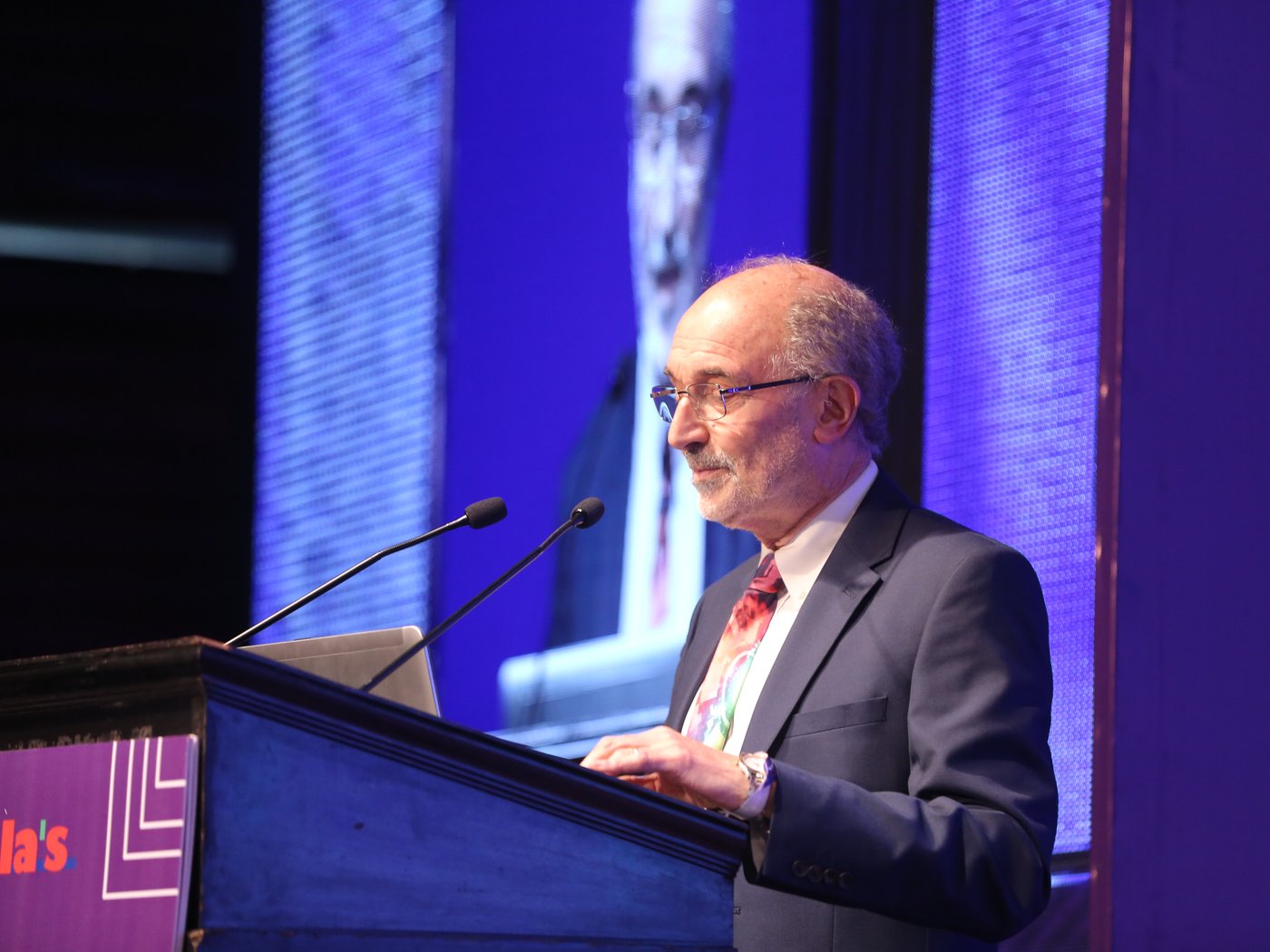A senior speaker delivering an industry outlook on the GLOBOIL India main stage